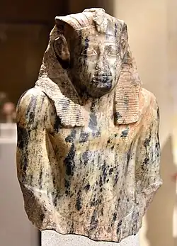 Upper part of a statue of Senusret I, from Egypt, Middle Kingdom, 12th Dynasty. c. 1950 BC. Neues Museum, Germany.