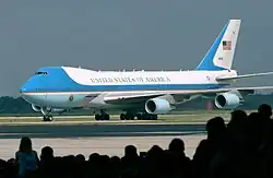 Image 9A Boeing 747 aircraft with livery designating it as Air Force One. The cyan forms, the US flag, presidential seal and the Caslon lettering, were all designed at different times, by different designers, for different purposes, and combined by designer Raymond Loewy in this one single aircraft exterior design. (from Graphic design)