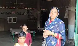 Van Gujjar woman with her children