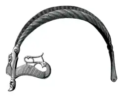Central and outer brow dragon heads on the Vendel I helmet (580–630)