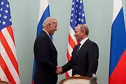 Biden greets Prime Minister of Russia, Vladimir Putin (2011)