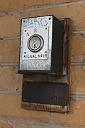 A Victorian Railways signal key attached to the Platform 1 building, May 2018