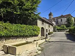 Rue de la Cure and Saint-Léger church