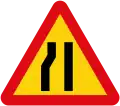 Road narrows (left)