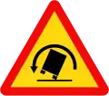 W.201c: Bend to the left with a danger of vehicle rollover