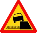 W.215c: Embankment along the left side of the road