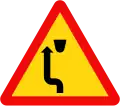 W.246b: Median strip ahead - pass on left side