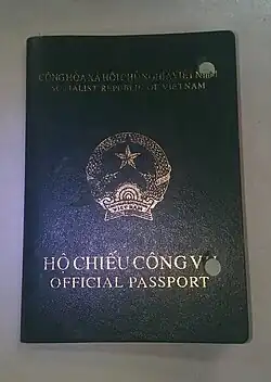 Official passport (expired and perforated).