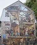 The fresque du Petite-Champlain, on the northern gable end of number 102
