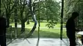 View of Whitworth Park from the interior of the art gallery, July 2023