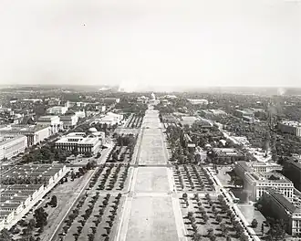 Image 98Rows of young American elm trees on the National Mall, looking east from the top of the Washington Monument, circa 1942 (from National Mall)