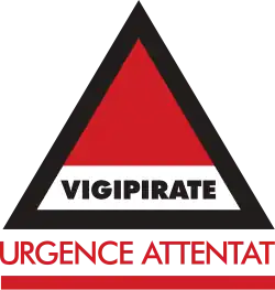 Vigipirate triangle with "Urgence Attentat" in red font
