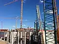September 2, 2014: pillars rise throughout the building's foundation