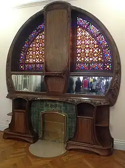 Salon fireplace today, with colored glass added by Jacques Majorelle