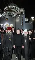 Vladimir Putin in front of the Church of Saint Sava