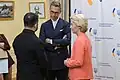 Zelenskyy, President of Finland Alexander Stubb, and von der Leyen confer beforehand at the Ukraine Embassy. Portrait: polymath and major historic figure Taras Shevchenko.