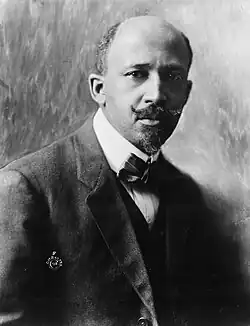 Formal black and white photo of an adult black man, head and upper body, facing the viewer.