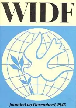 Poster featuring a flying dove with a olive branch over the globe.