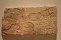 Limestone relief of Nefertiti kissing one of her daughters, Brooklyn Museum.
