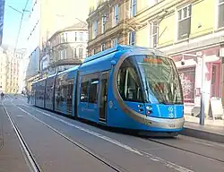 Urbos 3 No.20 in current livery at Grand Central tram stop