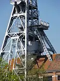 The headframes of shaft No. 1, the old and the new.