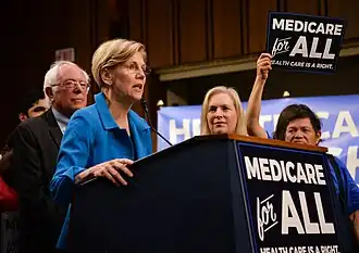Image 27Elizabeth Warren and Bernie Sanders campaigning for extended US Medicare coverage in 2017. (from Health politics)