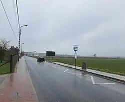A bust stop at Baletowa Street in Dawidy Zwykłe, in 2023.