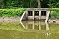 Waste weir. Note boards to adjust water height. The wicket at Pennyfield lock were open, draining the canal of water, hence, why the water level is lower than the boards.
