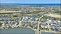 Aerial shot of western Waterways (prior to construction of the Peninsula Freeway), viewing southwest towards Port Phillip Bay