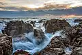 Image 14Waves on rocks at sunset in Sète, France