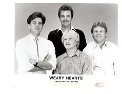 Baldassari (left) with the Weary Hearts bluegrass band.
