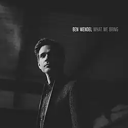 Gray square with a front portrait of Ben Wendel, with the words "What We Bring" at the top right