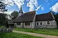 The C19 church of St Peter and Holy Cross at Wherwell, Hampshire, England. September 2024.