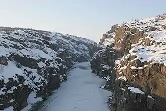 Frozen Drin River and the canyon seen from the bridge in January