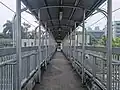 The access bridge above the Jakarta Inner Ring Road, note that there is no separated paid area between the two buildings