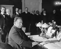 Image 9President William Howard Taft at his desk in the Oval Office, signing the statehood bill for New Mexico on January 6, 1912. (from History of New Mexico)