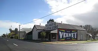 Wolseley historic shop with restored advertising sign on the side