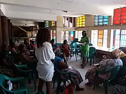 An image of a volunteer group having interaction and planning on development