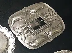 Silver Navajo belt buckle, Woolaroc