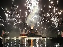 The World Showcase Lagoon at Epcot in Walt Disney World during IllumiNations: Reflections of Earth (the nightly fireworks show), 1/100 second exposure