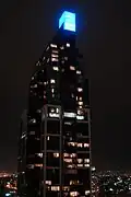 Illuminated roof feature at night