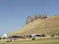 The mausoleum dome in 2014, top right of the image, relative to Beşbarmaq, with part of the village in the foreground