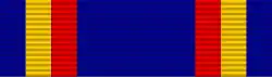 Dark blue ribbon with medium-width dark blue, yellow, and orange stripes at each border