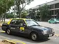 Toyota Crown Comfort, old yellow-top cab livery