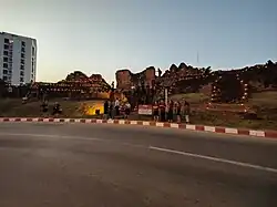 On the eve of the first Yo Peng day, thousands of candles at the old city walls