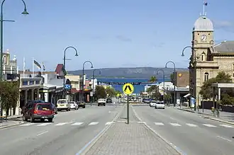 Shops and trees lining a street