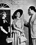 Pictured from left: Elspeth Eric (Lucia Standish), Barbara Weeks (Anne Malone), Sandy Becker (Dr. Jerry Malone). When the Malones move from Three Oaks to New York City, Lucia offers to sell them a home at a bargain price because she has designs on Jerry.