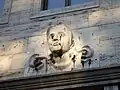 Breker sculpture above balcony windows