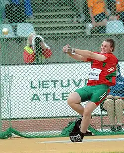 Image 19Yury Shayunou spinning with the hammer within the circle in hammer throw (from Track and field)