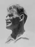 Alexander Zaid posing for a photograph.